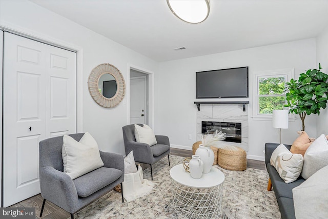 10 Taxi Way, Baltimore, MD 21220 - living area with wood finished floors, baseboards, and a high end fireplace