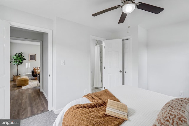 10 Taxi Way, Baltimore, MD 21220 - bedroom featuring a closet, ceiling fan, wood finished floors, and baseboards