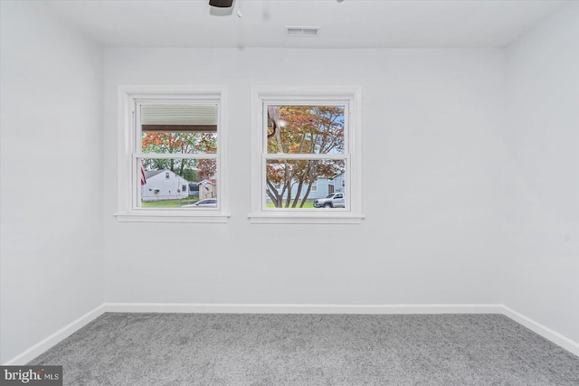 10 Taxi Way, Baltimore, MD 21220 - unfurnished room with carpet, baseboards, and a ceiling fan