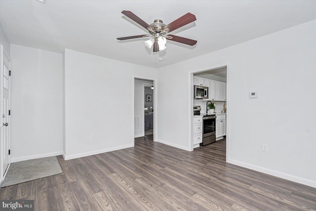 10 Taxi Way, Baltimore, MD 21220 - unfurnished living room with wood finished floors, a ceiling fan, and baseboards