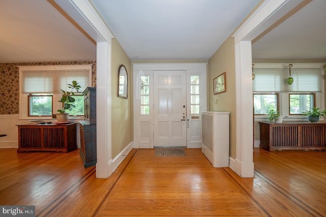 8317 High School Rd, Elkins Park, PA 19027 - foyer with radiator and light wood-type flooring