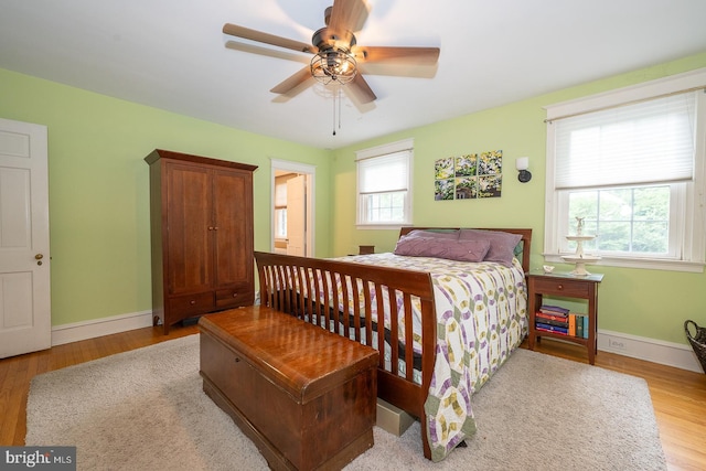 8317 High School Rd, Elkins Park, PA 19027 - bedroom with wood finished floors and a ceiling fan