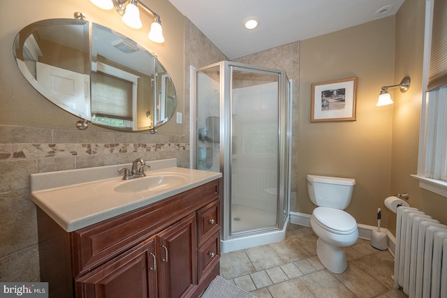 8317 High School Rd, Elkins Park, PA 19027 - full bath with radiator heating unit, vanity, a stall shower, tile walls, and tile patterned flooring
