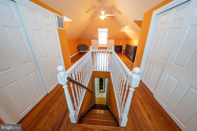 8317 High School Rd, Elkins Park, PA 19027 - stairway featuring wood finished floors, ceiling fan, and lofted ceiling