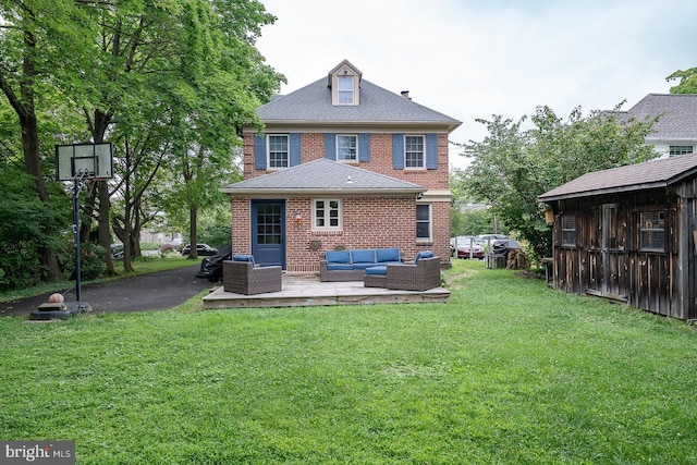 8317 High School Rd, Elkins Park, PA 19027 - rear view of house featuring outdoor lounge area, a lawn, brick siding, and a patio area