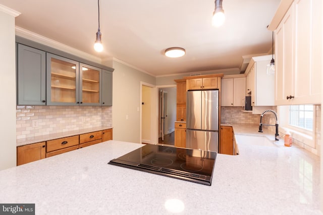 204 W Irvin Ave W, Hagerstown, MD 21742 - kitchen with freestanding refrigerator, electric stovetop, decorative backsplash, glass insert cabinets, and ornamental molding