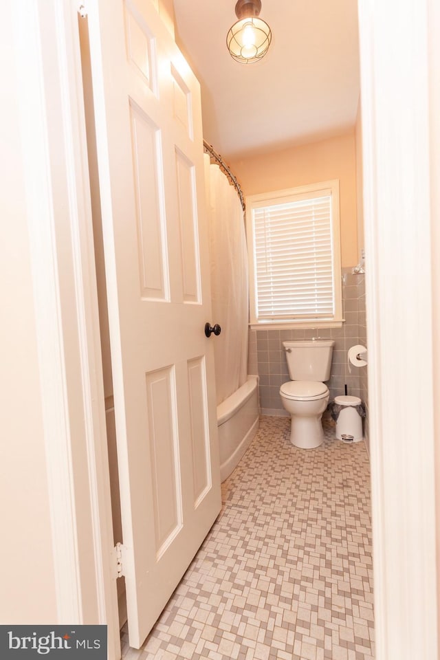 204 W Irvin Ave W, Hagerstown, MD 21742 - full bathroom with shower / bathtub combination with curtain, tile walls, tile patterned floors, and wainscoting