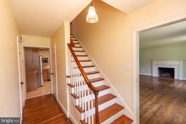 204 W Irvin Ave W, Hagerstown, MD 21742 - stairs featuring wood finished floors and a fireplace