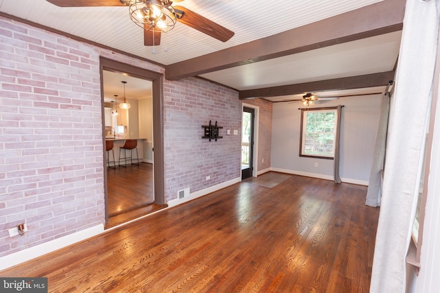 204 W Irvin Ave W, Hagerstown, MD 21742 - empty room featuring a ceiling fan, brick wall, beam ceiling, and wood finished floors