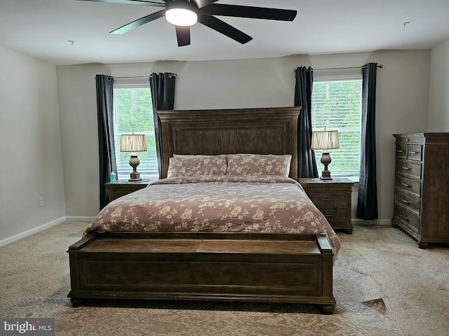 529 Birchwood Dr, Salisbury, MD 21804 - bedroom with light colored carpet, baseboards, and a ceiling fan