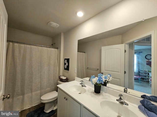529 Birchwood Dr, Salisbury, MD 21804 - full bathroom featuring double vanity, toilet, and shower / tub combo