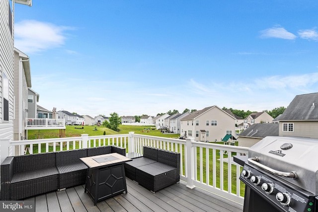 325 Hickory Ridge Cir, York, PA 17404 - deck featuring a residential view, an outdoor living space with a fire pit, grilling area, and a lawn
