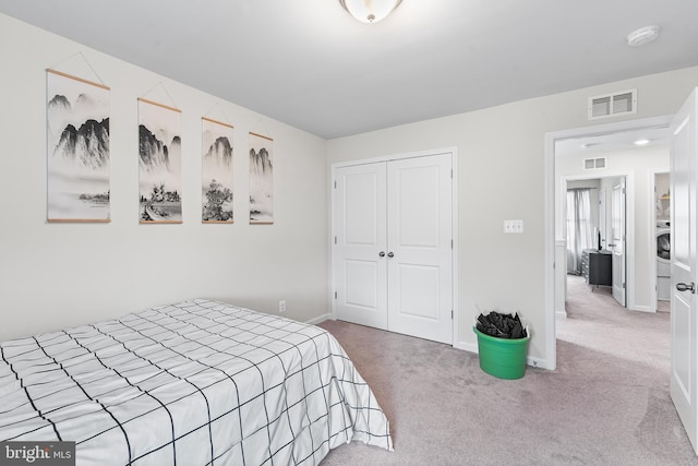 325 Hickory Ridge Cir, York, PA 17404 - carpeted bedroom with a closet, washer / dryer, and baseboards