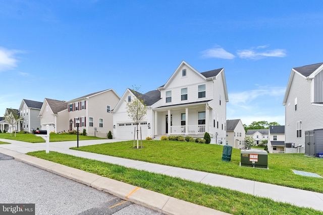 325 Hickory Ridge Cir, York, PA 17404 - view of front of home with a residential view, board and batten siding, a porch, and concrete driveway