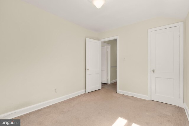 7307 15th Ave, Takoma Park, MD 20912 - unfurnished bedroom with light carpet and baseboards