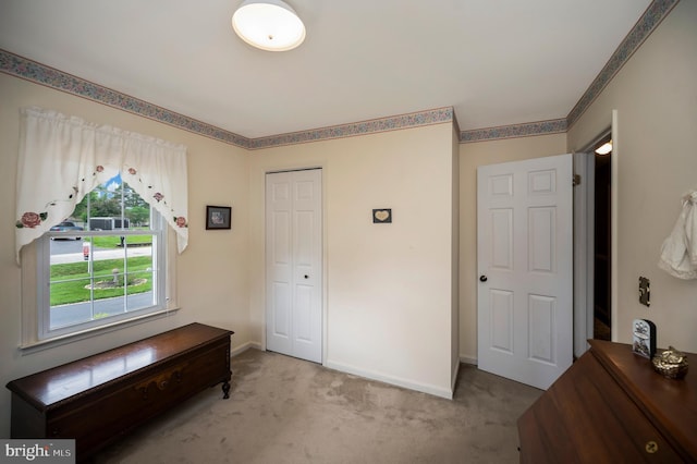 806 Edwards Dr, Fredericksburg, VA 22405 - unfurnished bedroom with light colored carpet, a closet, and baseboards
