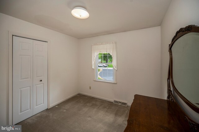 806 Edwards Dr, Fredericksburg, VA 22405 - unfurnished bedroom featuring carpet flooring, baseboards, and a closet