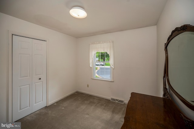 806 Edwards Dr, Fredericksburg, VA 22405 - unfurnished bedroom featuring carpet, a closet, and baseboards