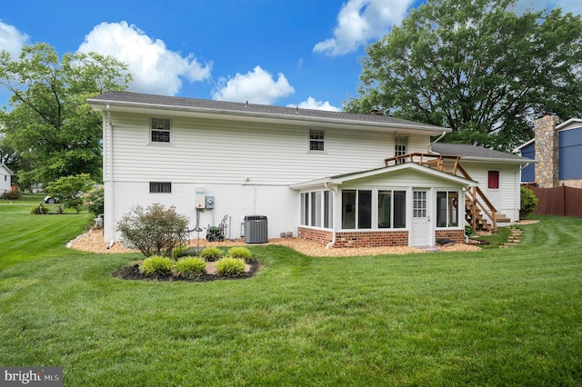 806 Edwards Dr, Fredericksburg, VA 22405 - rear view of house with central air condition unit and a sunroom