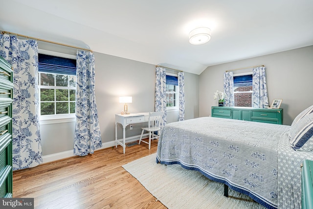 1615 Webster St NE, Washington, DC 20017 - bedroom with wood finished floors, baseboards, and vaulted ceiling