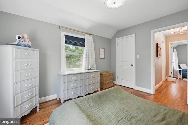 1615 Webster St NE, Washington, DC 20017 - bedroom with wood finished floors, baseboards, and lofted ceiling