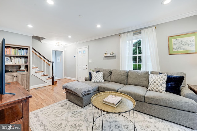 1615 Webster St NE, Washington, DC 20017 - living area with stairs, recessed lighting, ornamental molding, wood finished floors, and baseboards