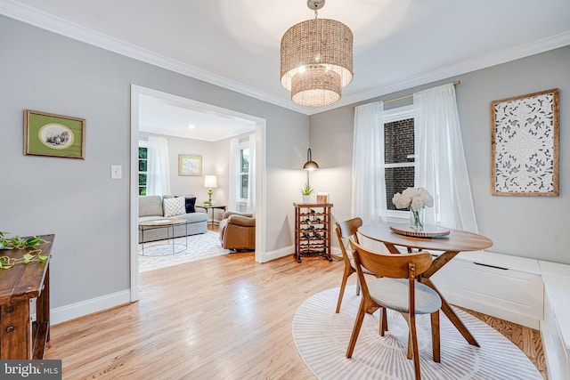 1615 Webster St NE, Washington, DC 20017 - office area featuring light wood-type flooring, crown molding, a chandelier, and baseboards