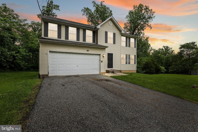 7525 Gum Spring Rd, Baltimore, MD 21237 - view of front facade with asphalt driveway, an attached garage, and a front yard