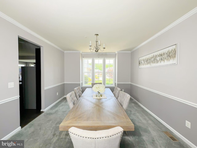 9506 Manor Oaks Vw, Upper Marlboro, MD 20772 - dining area with a chandelier, baseboards, ornamental molding, and carpet