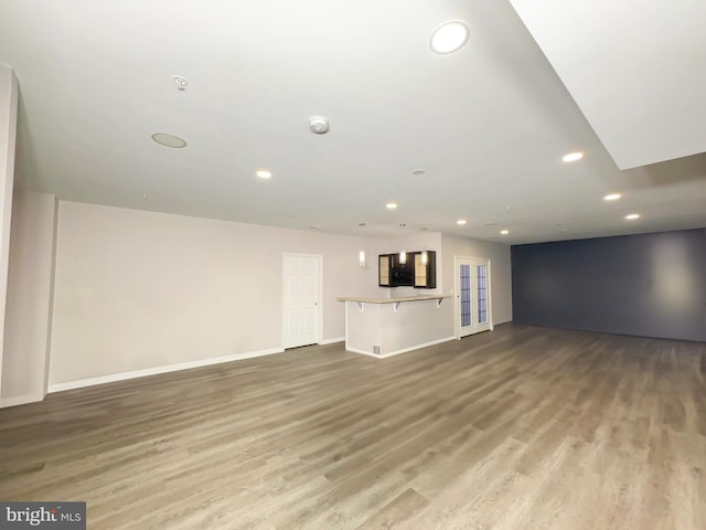 9506 Manor Oaks Vw, Upper Marlboro, MD 20772 - unfurnished living room with wood finished floors, recessed lighting, and baseboards