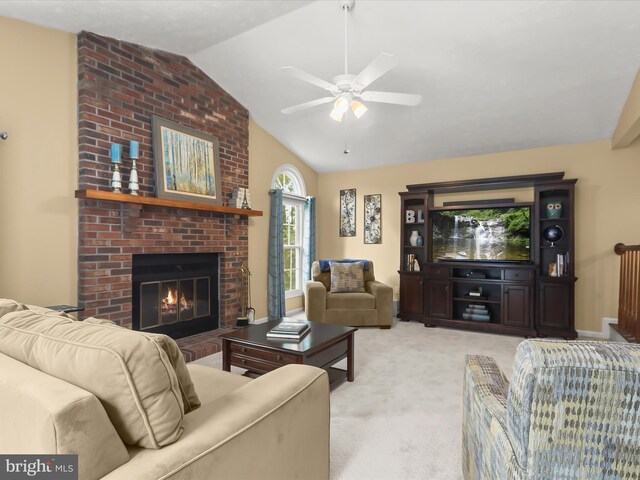 6601 Stipa Ct, Elkridge, MD 21075 - living area featuring vaulted ceiling, a ceiling fan, a brick fireplace, and carpet flooring