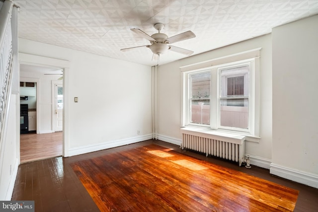 1926 W Broad St, Bethlehem, PA 18018 - spare room featuring radiator heating unit, hardwood / wood-style flooring, healthy amount of natural light, and a ceiling fan