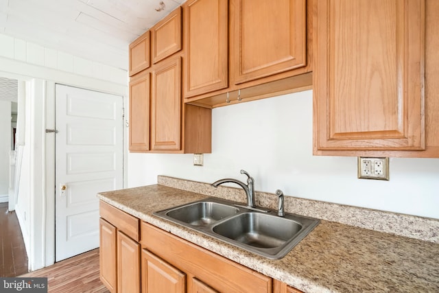 1926 W Broad St, Bethlehem, PA 18018 - kitchen featuring a sink, light wood-style flooring, and light countertops