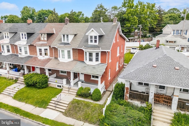 1926 W Broad St, Bethlehem, PA 18018 - view of front of home featuring brick siding, a chimney, covered porch, and a residential view