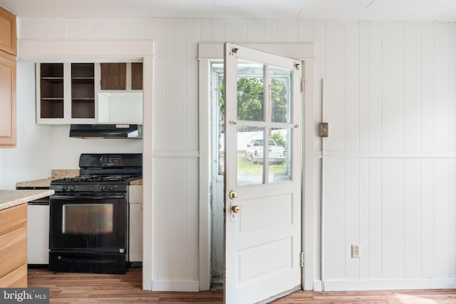 1926 W Broad St, Bethlehem, PA 18018 - kitchen with gas stove, under cabinet range hood, light wood-style floors, and light countertops