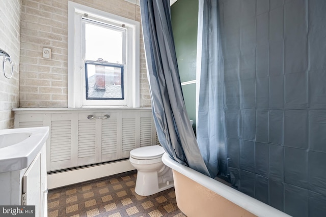 1926 W Broad St, Bethlehem, PA 18018 - full bathroom featuring a baseboard radiator, vanity, toilet, tile patterned floors, and shower / tub combo with curtain
