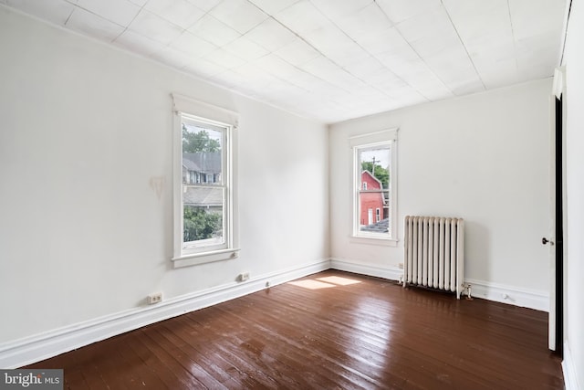 1926 W Broad St, Bethlehem, PA 18018 - unfurnished room featuring radiator, wood-type flooring, healthy amount of natural light, and baseboards