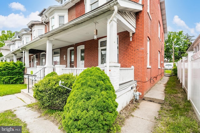 1926 W Broad St, Bethlehem, PA 18018 - view of side of property with brick siding and covered porch