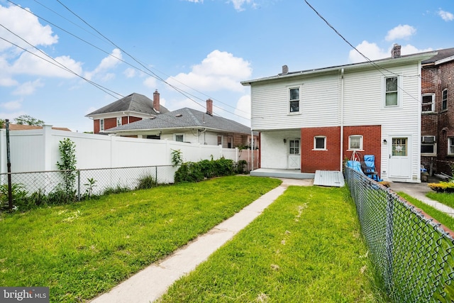 1926 W Broad St, Bethlehem, PA 18018 - rear view of house featuring brick siding and a chimney