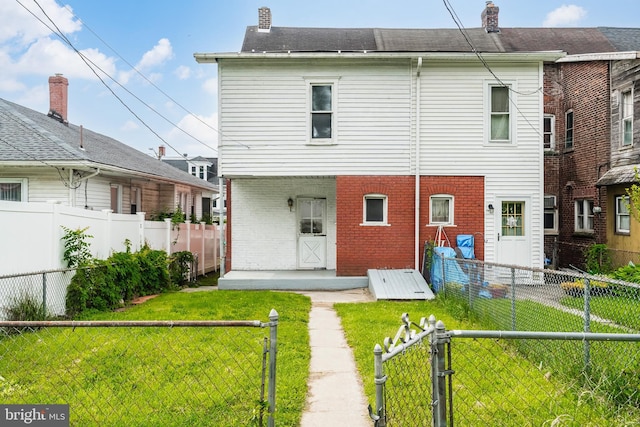 1926 W Broad St, Bethlehem, PA 18018 - back of property with brick siding, a chimney, and a gate
