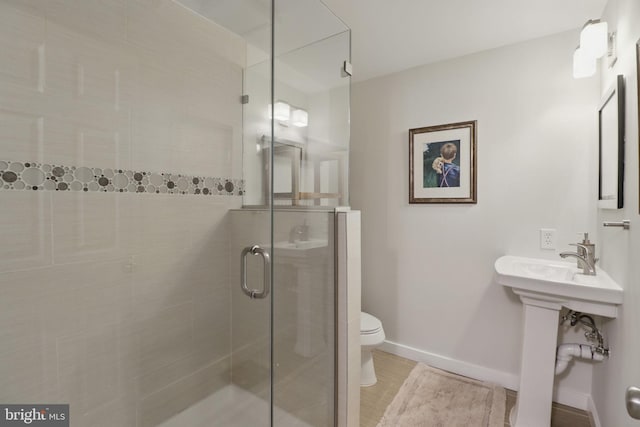 1367 Cedar Ave, Annapolis, MD 21403 - full bath with toilet, a stall shower, and baseboards