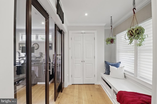 1367 Cedar Ave, Annapolis, MD 21403 - mudroom with light wood finished floors, ornamental molding, and french doors