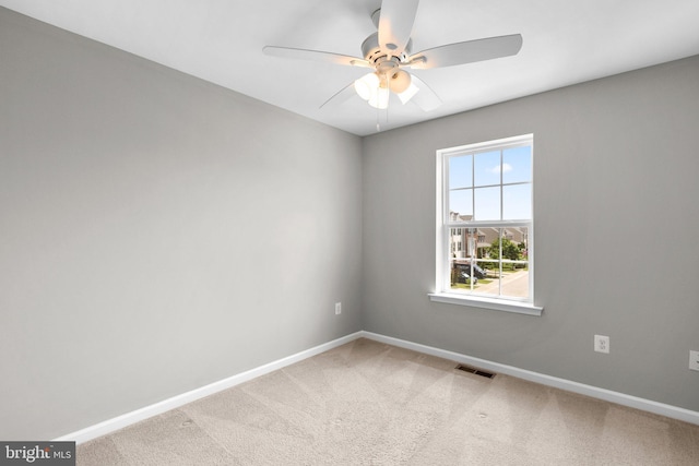 9778 Peace Springs Rdg, Laurel, MD 20723 - carpeted spare room with ceiling fan and baseboards