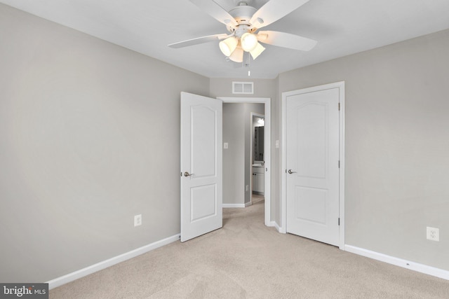 9778 Peace Springs Rdg, Laurel, MD 20723 - unfurnished bedroom with light colored carpet and a ceiling fan