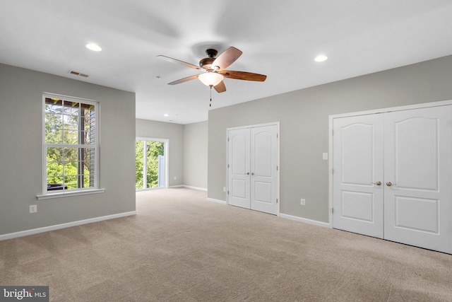 9778 Peace Springs Rdg, Laurel, MD 20723 - unfurnished bedroom featuring multiple closets, carpet flooring, recessed lighting, and ceiling fan