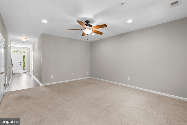 9778 Peace Springs Rdg, Laurel, MD 20723 - spare room featuring light colored carpet, a ceiling fan, and recessed lighting