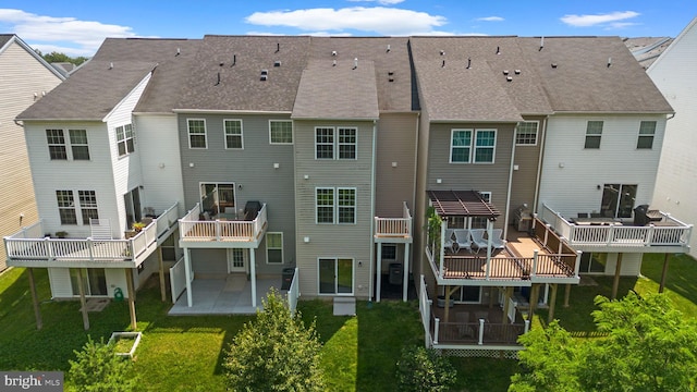 9778 Peace Springs Rdg, Laurel, MD 20723 - back of property with a patio, a lawn, a deck, and roof with shingles