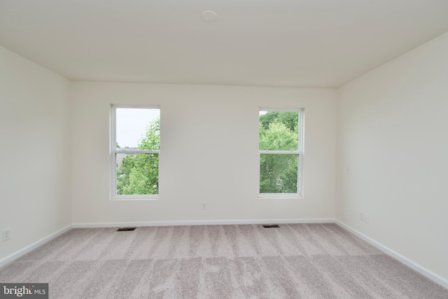 17023 Gibson Mill Rd, Dumfries, VA 22026 - carpeted empty room featuring baseboards