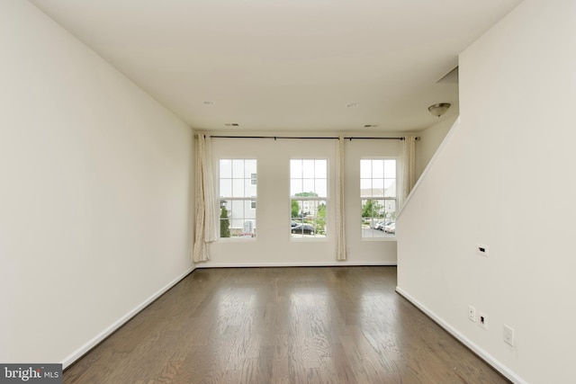 17023 Gibson Mill Rd, Dumfries, VA 22026 - spare room featuring baseboards and wood finished floors