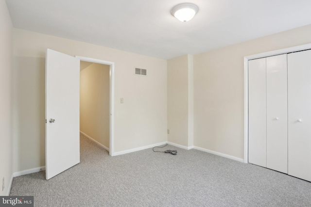 1018 W 7th St, Wilmington, DE 19805 - unfurnished bedroom with carpet, a closet, and baseboards
